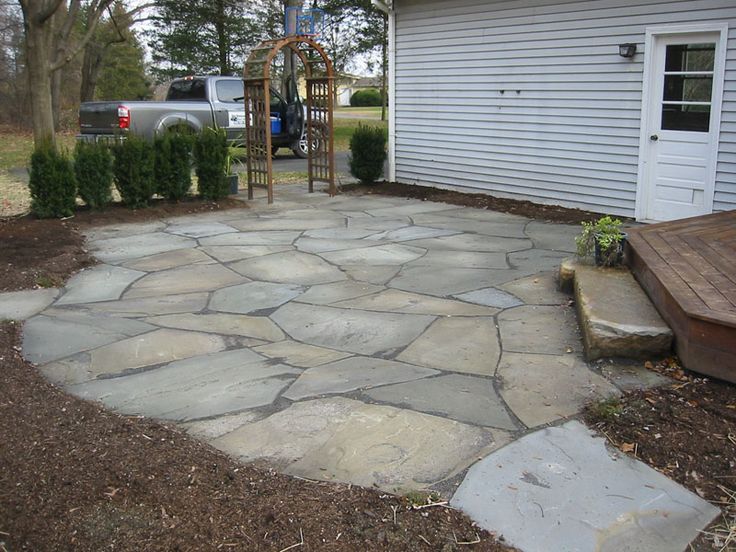20 Exclusive Stone Patio Designs, How To Install A Flagstone Patio With Irregular Stones