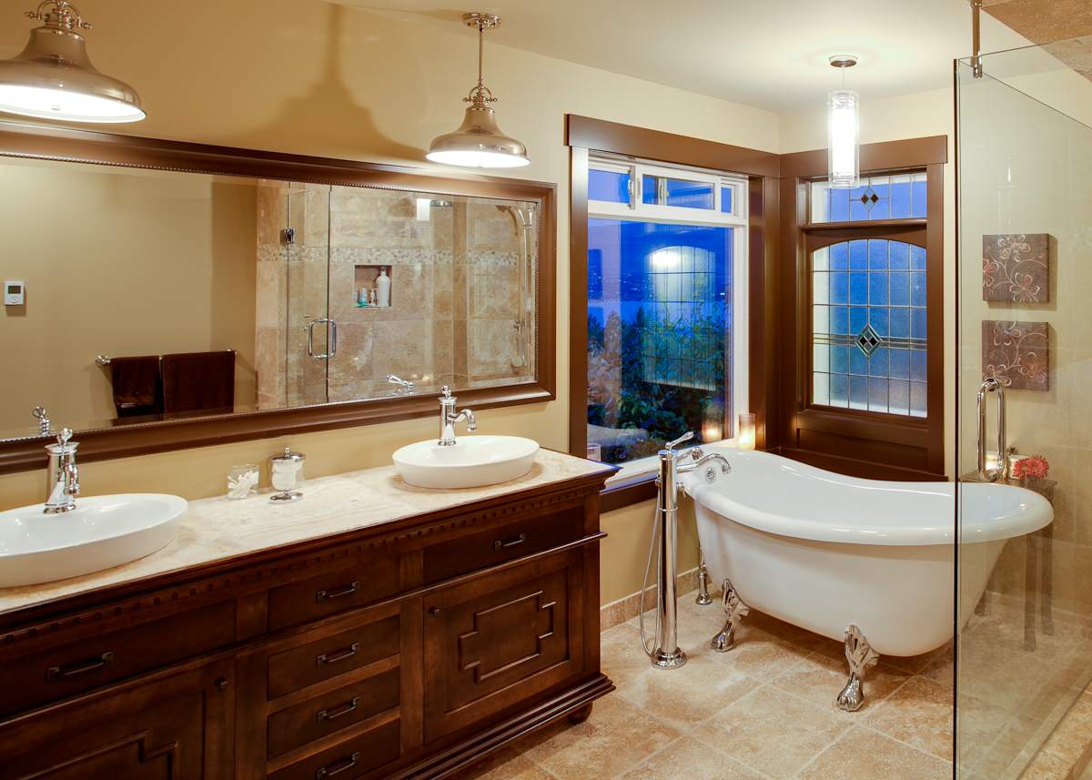 soaking-tub-with-glass-shower-panel-and-tile-flooring-for-traditional-bathroom-design-with-pendant-lighting-and-bathroom-vanity-cabinets-plus-vessel-sink-faucets-also-vanity-mirror