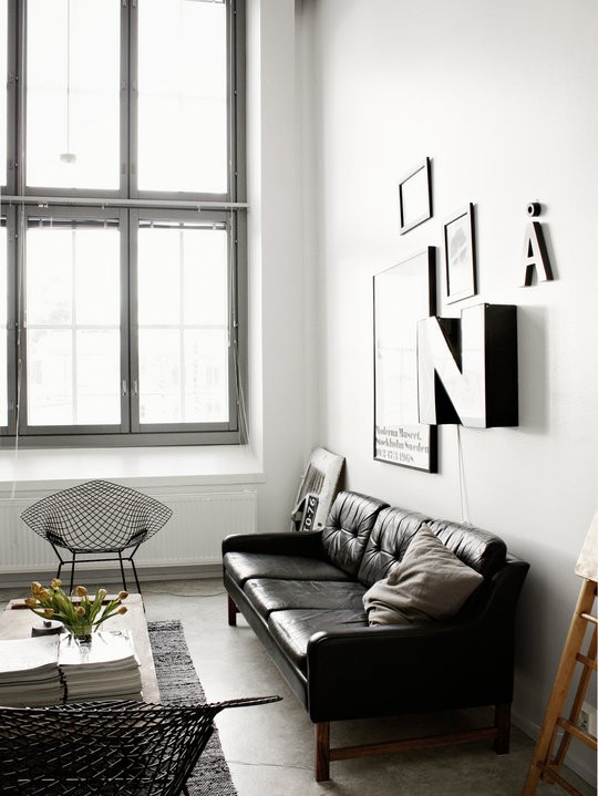 stylish mid century living room with black and white